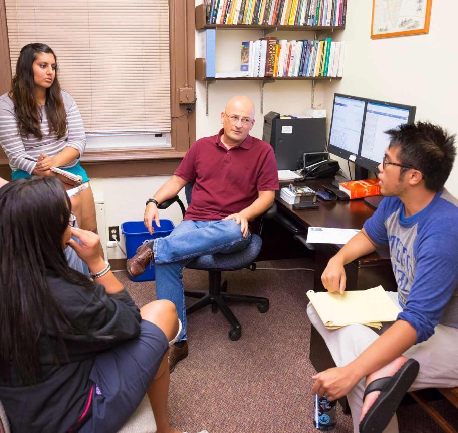 Faculty in conversation with students